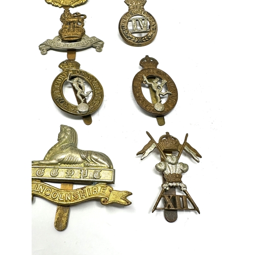 433 - 10 military cap badges