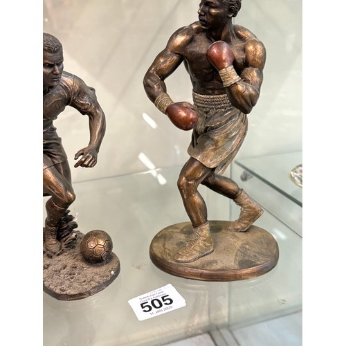 505 - Two sporting ornaments, to include football and boxing figures tallest measures approximately 9 inch... 