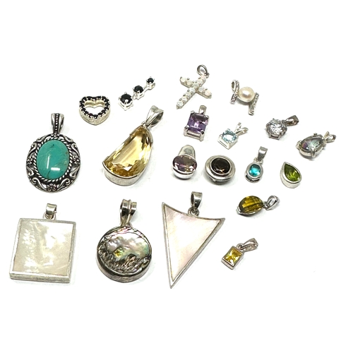 302 - selection of  silver gemstone set pendants