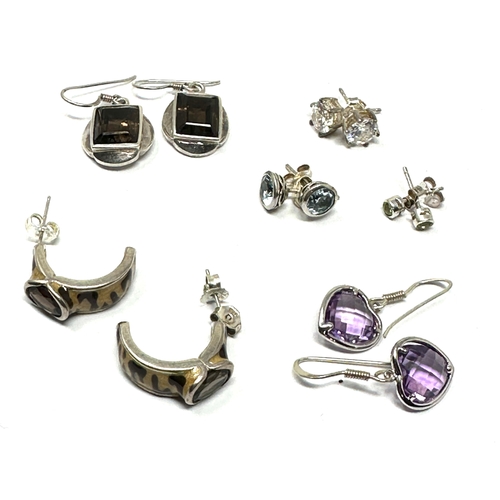 303 - 6 pairs of silver gemstone set earrings