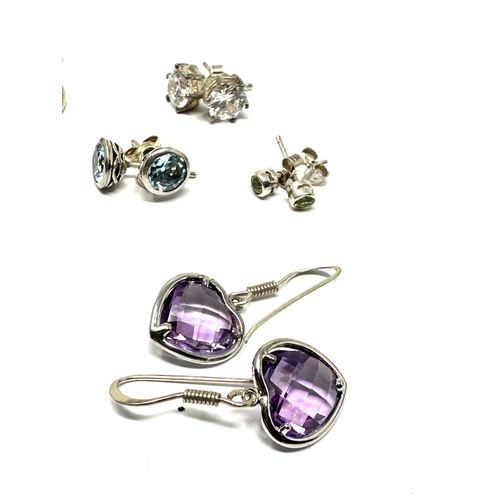 303 - 6 pairs of silver gemstone set earrings