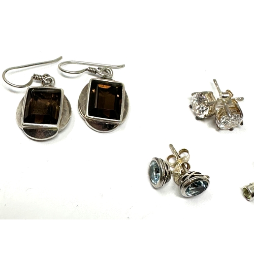 303 - 6 pairs of silver gemstone set earrings