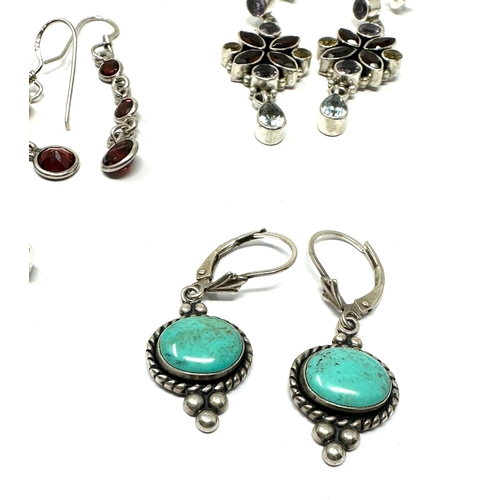 304 - 6 pairs of silver gemstone set earrings