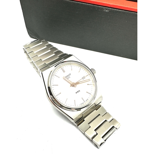 460 - Boxed Tissot 1853 PRX Gents wristwatch the watch is ticking with all boxed booklet and receipt as ne... 