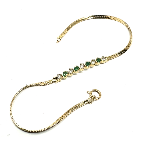 184 - 14ct gold diamond & emerald bracelet weight 3.5g