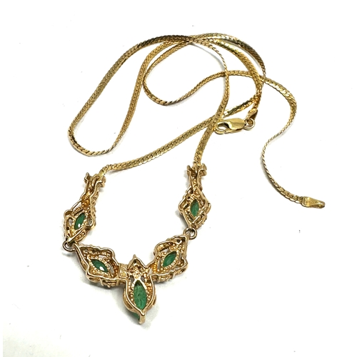 185 - 9ct gold diamond & emerald necklace weight 6.2g