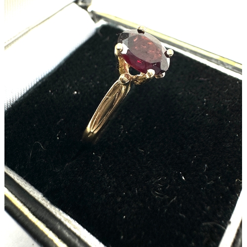 193 - 9ct gold garnet ring weight 1.6g