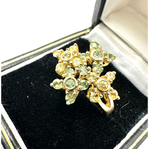 197 - 9ct gold yellow & green gemstone ring weight 3.5g