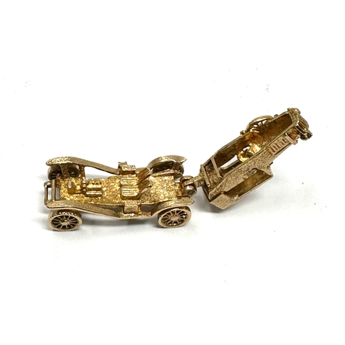 199 - heavy vintage 9ct gold opening car charm weight approx 8g