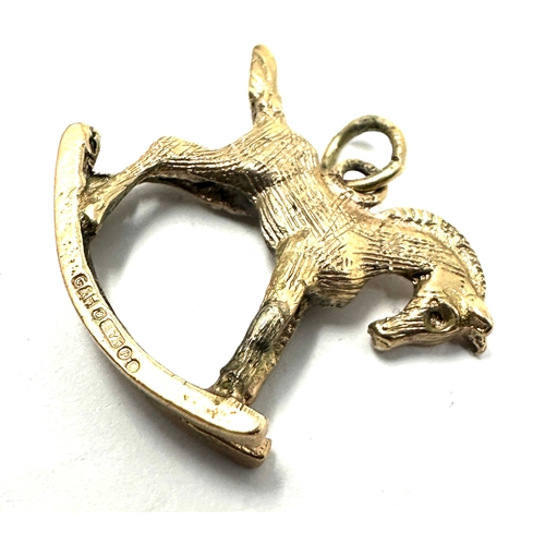 201 - 9ct gold rocking horse charm