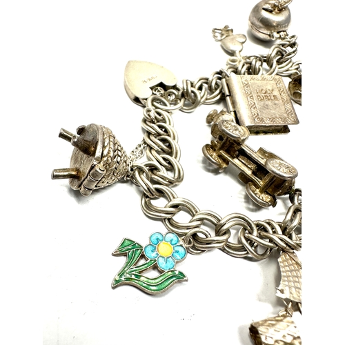 329 - Vintage silver charm bracelet weight 42g