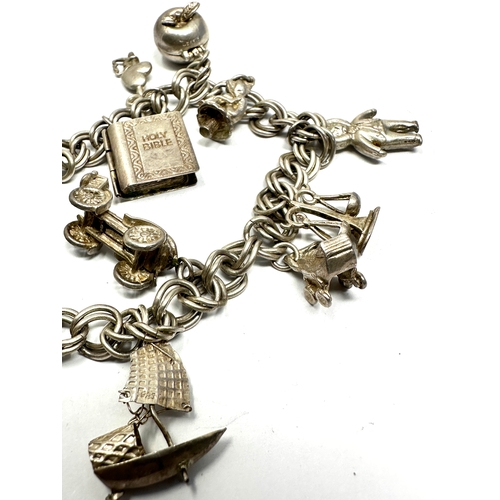 329 - Vintage silver charm bracelet weight 42g