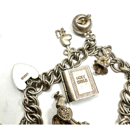 329 - Vintage silver charm bracelet weight 42g