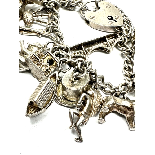 330 - vintage silver charm bracelet & charms inc opening charms weight 68g