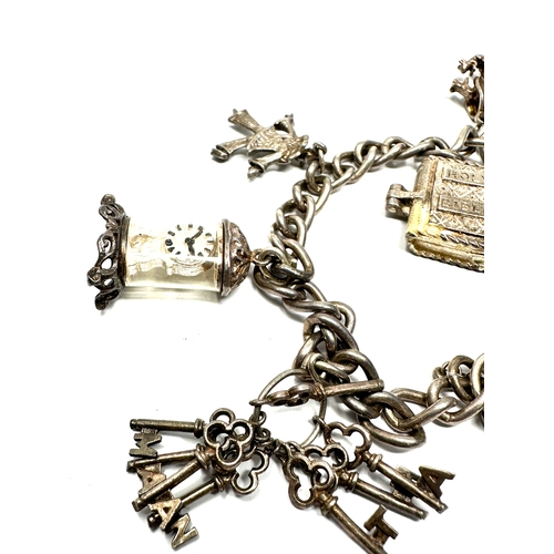 331 - Vintage silver charm bracelet & charms inc opening charms weight 36g