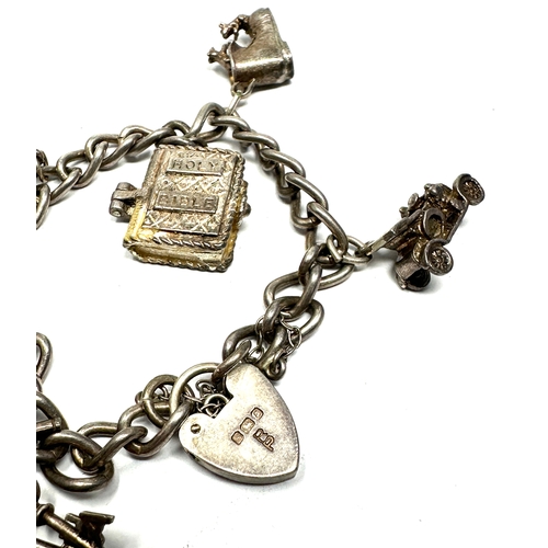 331 - Vintage silver charm bracelet & charms inc opening charms weight 36g