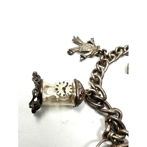 331 - Vintage silver charm bracelet & charms inc opening charms weight 36g