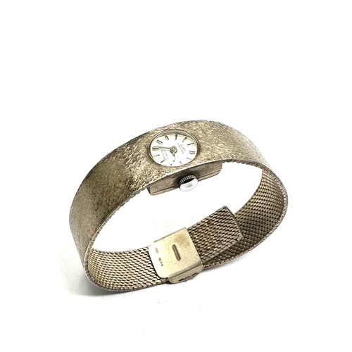 333 - Vintage silver limit international ladies wrist watch and strap weight 35g the watch is ticking