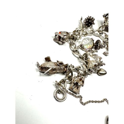 334 - Vintage silver charm bracelet & charms weight 38g