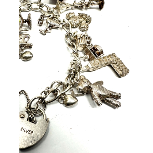 334 - Vintage silver charm bracelet & charms weight 38g