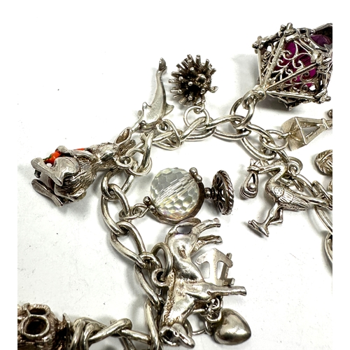 334 - Vintage silver charm bracelet & charms weight 38g