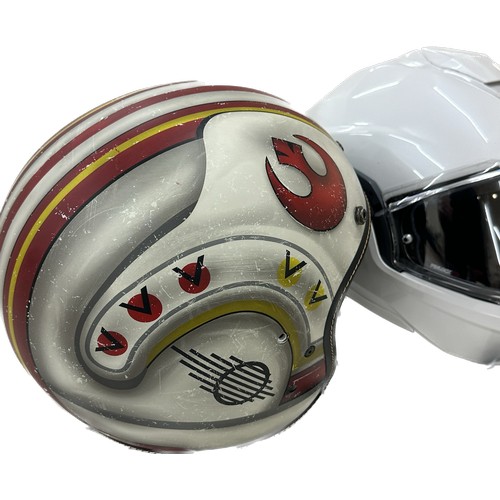 8 - 2 Helmets includes HJC and Starwars