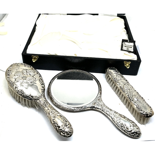 68 - Antique / vintage  boxed set of cherub detail silver dressing table mirror & brush set