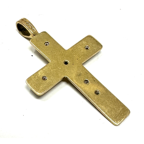 89 - Vintage 9ct gold  diamond cross weight 5.2g measures approx 4.5cm by 2.7g