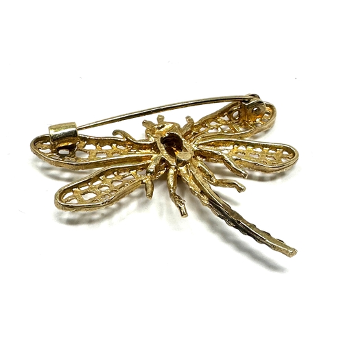 70 - 9ct gold & citrine gemstone set dragonfly brooch measures approx 3.7cm wide 3cm drop weight 4.1g