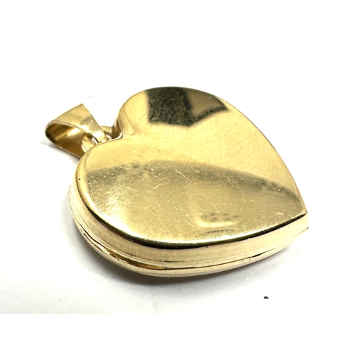 80 - 14ct gold & diamond locket weight 2.35g