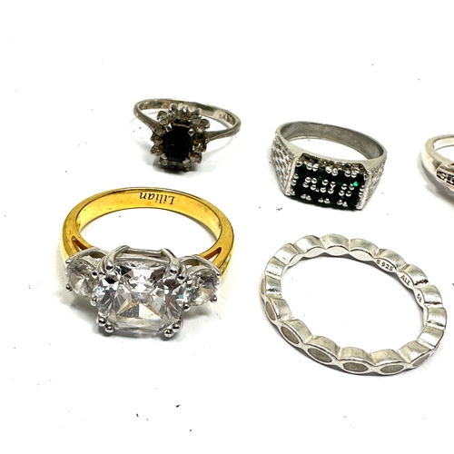 353 - 8 silver gemstone rings