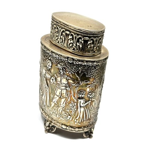 2 - Fine silver scenic embossed tea caddy measures approx height 12cm weight 150g