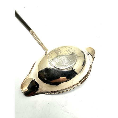 20 - Antique silver coin set toddy ladle with horn twisted handle measures approx 32cm long