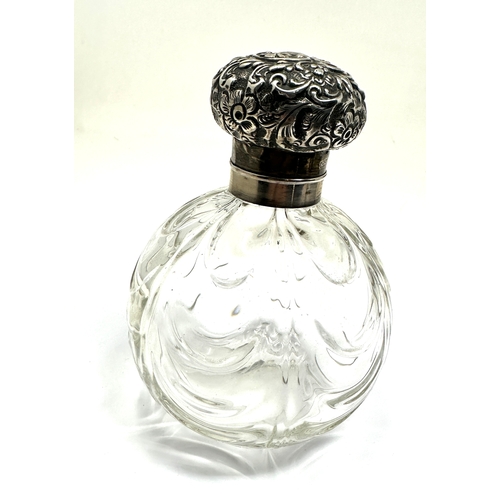 22 - Antique silver top perfume bottle measures approx height 12cm