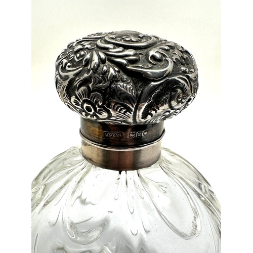 22 - Antique silver top perfume bottle measures approx height 12cm