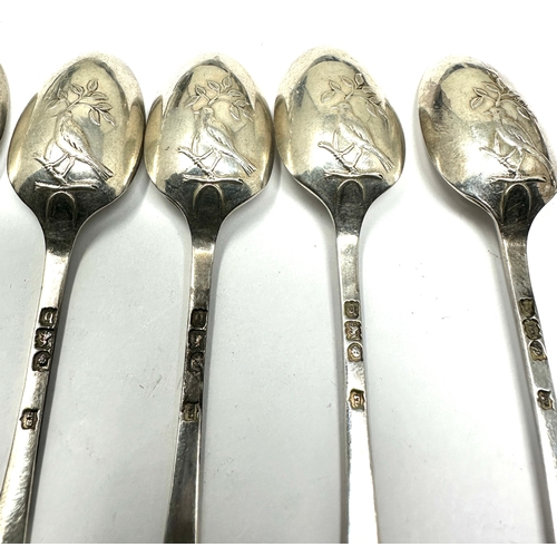 28 - 12 Antique silver tea spoons bird on branch detail to back of spoons london silver hallmarks