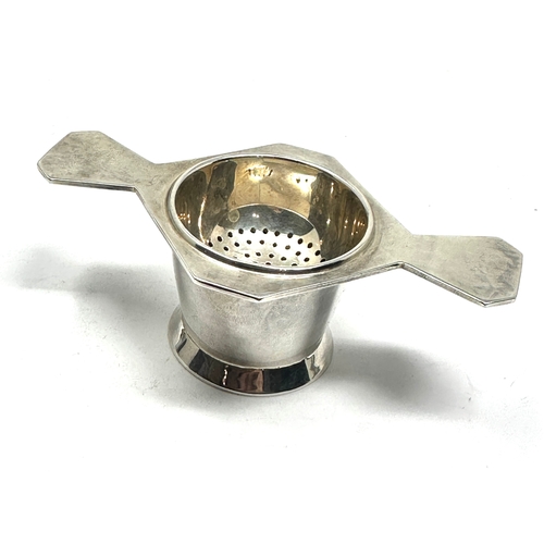 38 - Vintage silver tea strainer and stand weight 100g