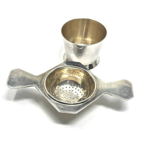 38 - Vintage silver tea strainer and stand weight 100g