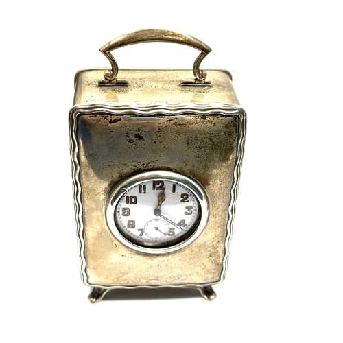 39 - Antique silver carriage clock measures approx 14cm from top of handle to feet by 7.5cm weight 312g n... 