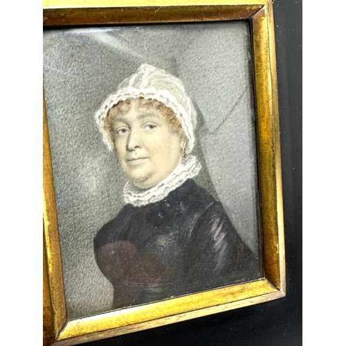 497 - 18ct century miniature painting of a woman in white bonnet in black frame details on back picture me... 