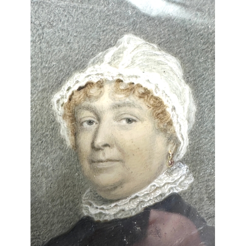 497 - 18ct century miniature painting of a woman in white bonnet in black frame details on back picture me... 