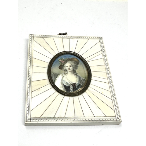 499 - Antique miniature painting of a young lady oval picture measures approx 5.3cm by 4.4cm