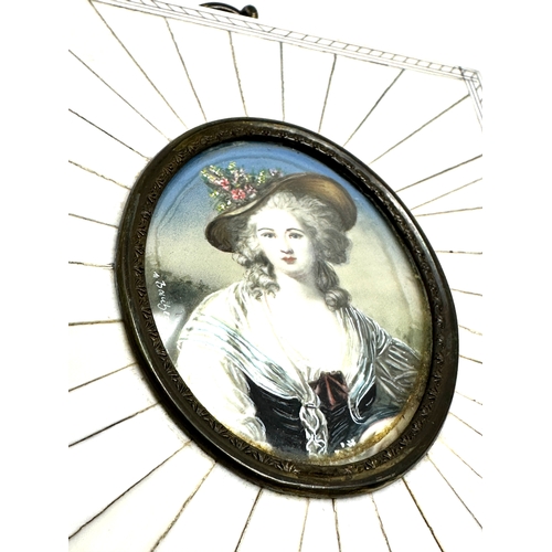 499 - Antique miniature painting of a young lady oval picture measures approx 5.3cm by 4.4cm