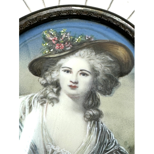 499 - Antique miniature painting of a young lady oval picture measures approx 5.3cm by 4.4cm