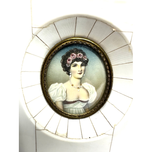 500 - Antique miniature painting of a young lady oval picture measures approx 5.3cm by 4.4cm