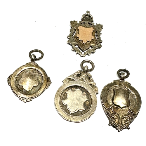 10 - 4 antique silver fobs weight 30g