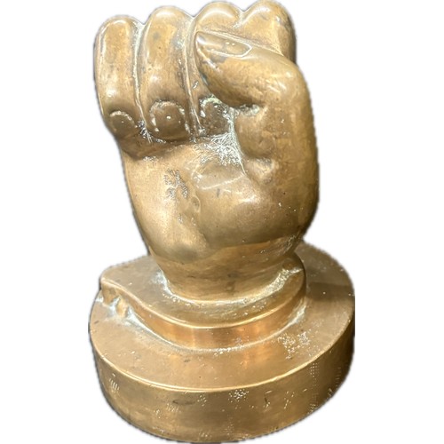 103 - Pair solid brass solidarity fists, possible trench art approximate height 5 inches, combined weight ... 