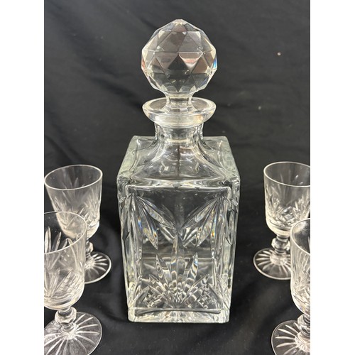 594 - Cut glass decanter with 6 matching sherry glasses