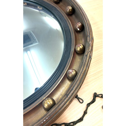 60 - 2 Antique circular convex wall mirrors, largest measures approximately 22 inches in diameter