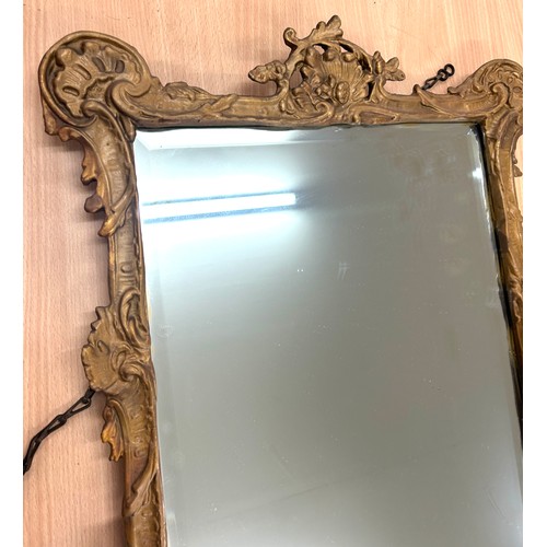 25 - Antique gilt frame mirror, approximate measurements: Height 34 inches, Width 19 inches